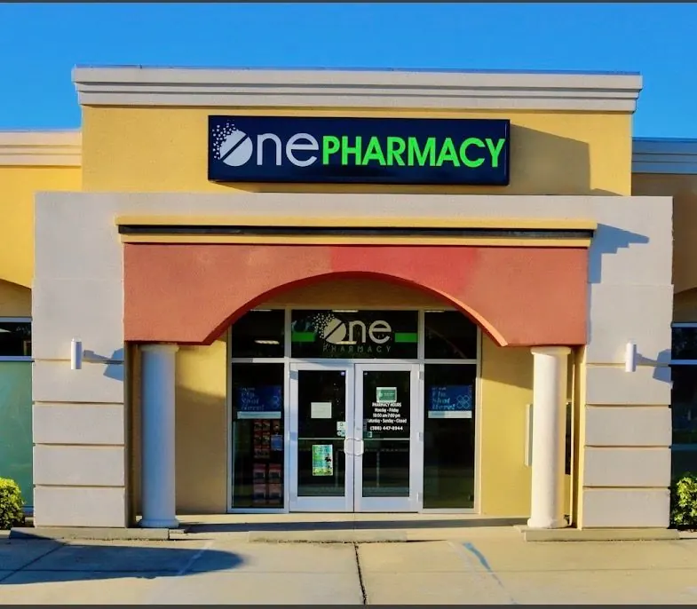 ONE Pharmacy storefront with the pharmacy sign above the entrance